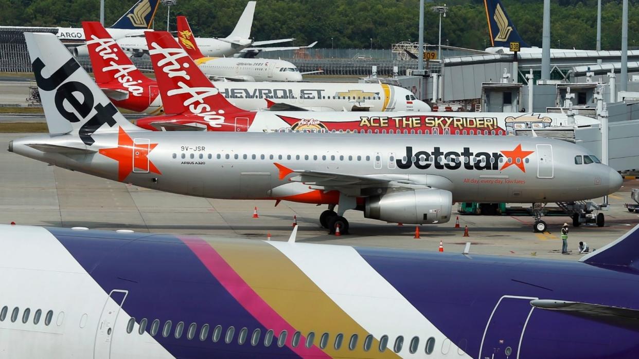 Jetstar plane and other cheap airfare carrier planes.