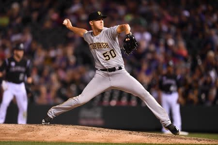 Aug 7, 2018; Denver, CO, USA; Pittsburgh Pirates starting pitcher Jameson Taillon (50) delivers a pitch in the ninth inning against the Colorado Rockies at Coors Field. Mandatory Credit: Ron Chenoy-USA TODAY Sports