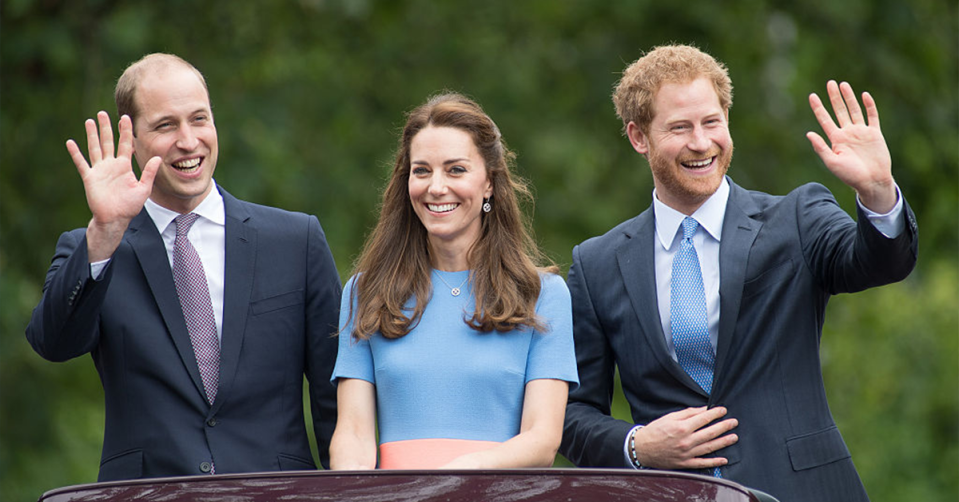 Prince William, Kate Middleton and Prince Harry looking happy together.