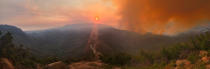 <p>Smoke from the Whittier fire is illuminated by the setting sun in a view from West Camino Cielo road near Santa Barbara, California, U.S. July 11, 2017. (Mike Eliason/Santa Barbara County Fire/Handout via Reuters) </p>