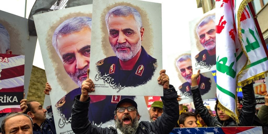 Protesters hold pictures of Iranian commander Qasem Soleimani, during a demonstration outside the US consulate in Istanbul, on January 5, 2020, two days after top Iranian commander Qasem Soleimani was killed by a US drone strike