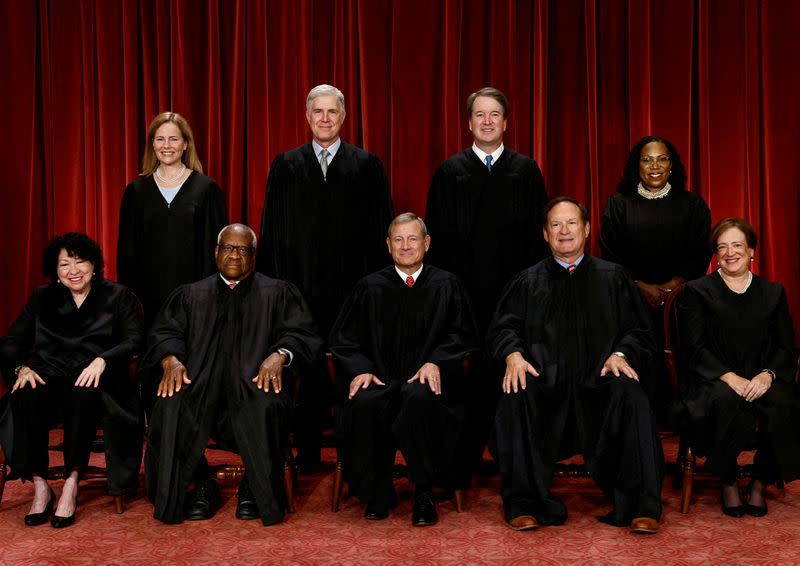 FILE PHOTO: U.S. Supreme Court justices pose for their group portrait at the Supreme Court in Washington