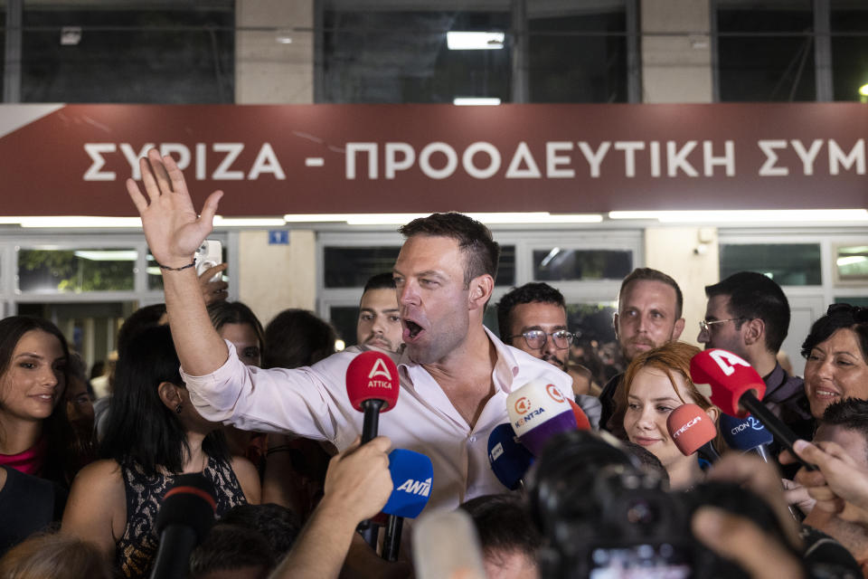 Stefanos Kasselakis, newly elected leader of main opposition party Syriza, speaks to supporters outside the party's headquarters in Athens, Greece, Monday, Sept. 25, 2023, after a runoff election for the left-wing bloc. (AP Photo/Yorgos Karahalis)