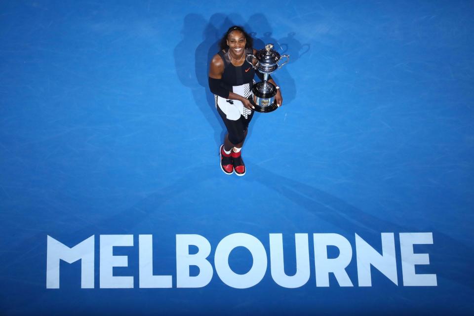 Serena Williams poses with her trophy after winning the 2017 Australian Open.