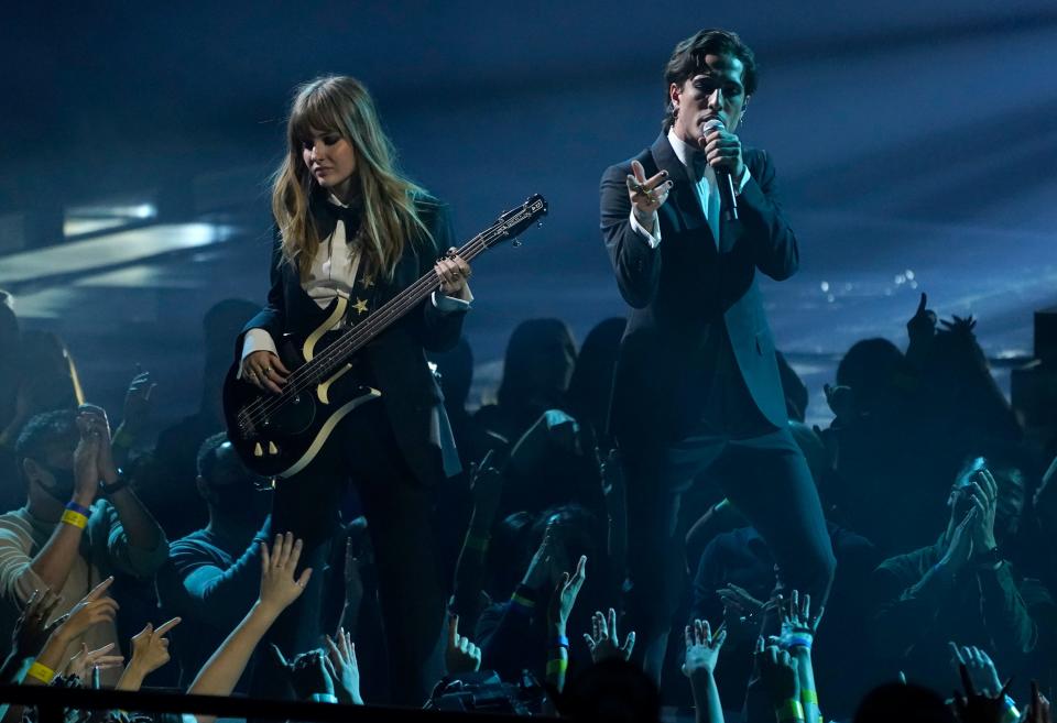 Victoria De Angelis, left, and Damiano David of Maneskin perform "Beggin'" at the American Music Awards on Sunday, Nov. 21, 2021 at Microsoft Theater in Los Angeles.