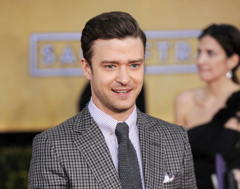 FILE - This Jan. 27, 2013 file photo shows actor-singer Justin Timberlake at the 19th Annual Screen Actors Guild Awards at the Shrine Auditorium in Los Angeles. The Recording Academy announced Wednesday, Jan. 30, that the pop star will perform at the awards show on Feb. 10. (Photo by Chris Pizzello/Invision/AP)