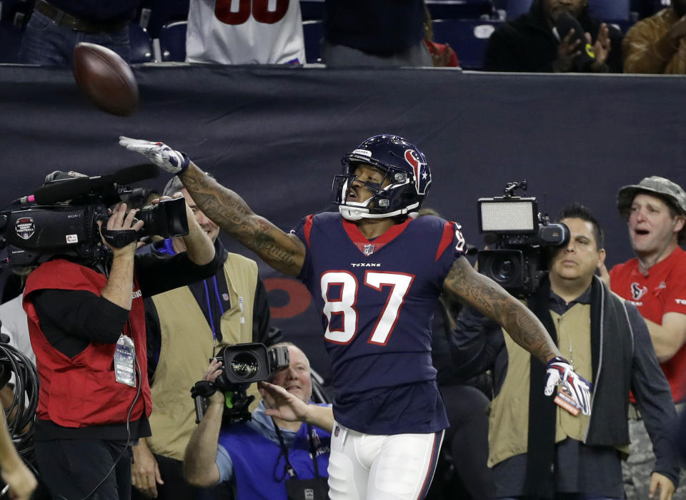 Receiver Demaryius Thomas (87) celebrates touchdown catch last season. (AP)