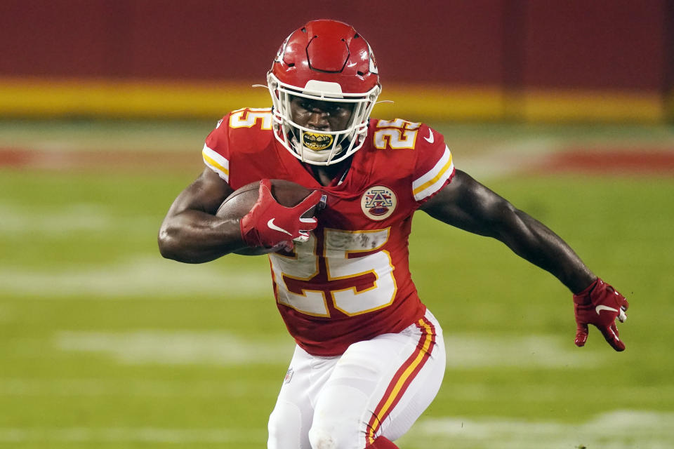 Kansas City Chiefs running back Clyde Edwards-Helaire carries the ball against the Houston Texans in the first half of an NFL football game Thursday, Sept. 10, 2020, in Kansas City, Mo. (AP Photo/Charlie Riedel)