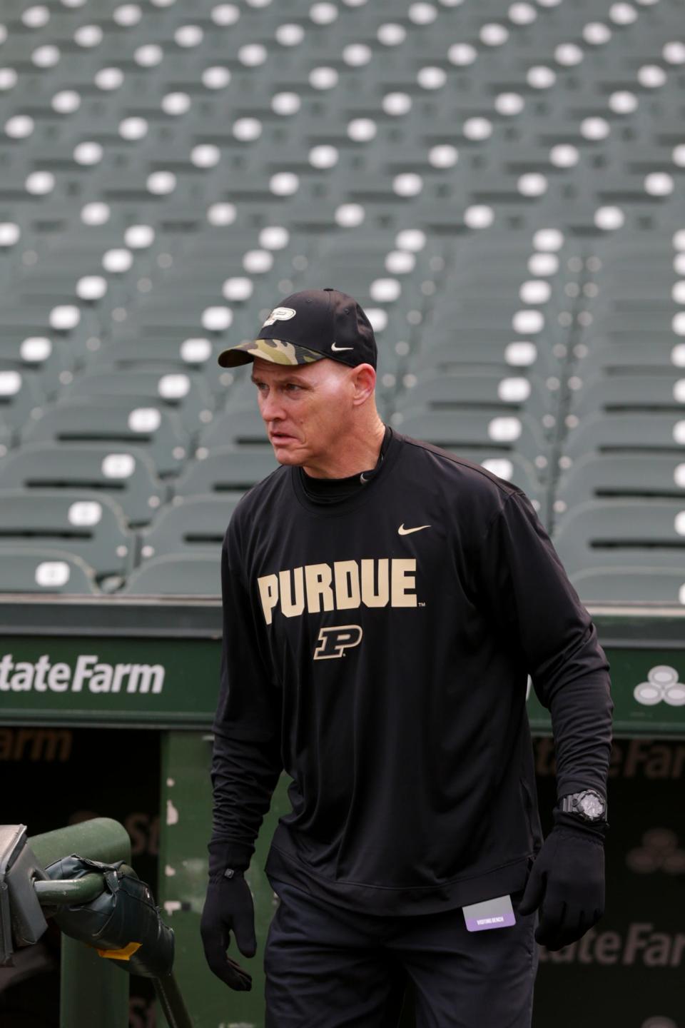 Purdue assistant coach Mark Hagen walks onto Wrigley Field prior to the start of an NCAA football game between the Purdue Boilermakers and the Northwestern Wildcats, Saturday, Nov. 20, 2021 in Chicago.