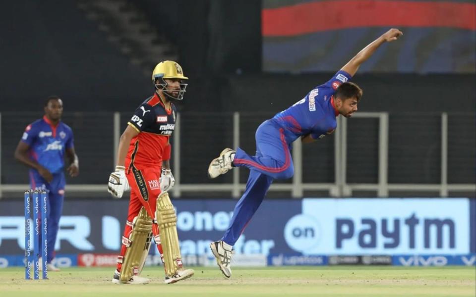 Avesh Khan of the Delhi Capitals bowling against the Royal Challengers Bangalore last month - SPORTZPICS