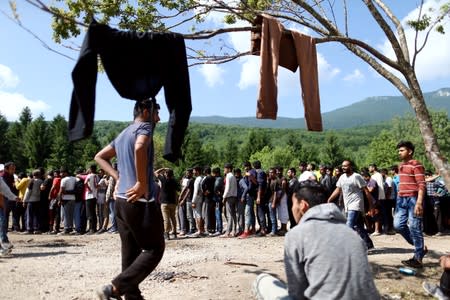 Migrants are seen at the migrant camp Vucjak in Bihac area