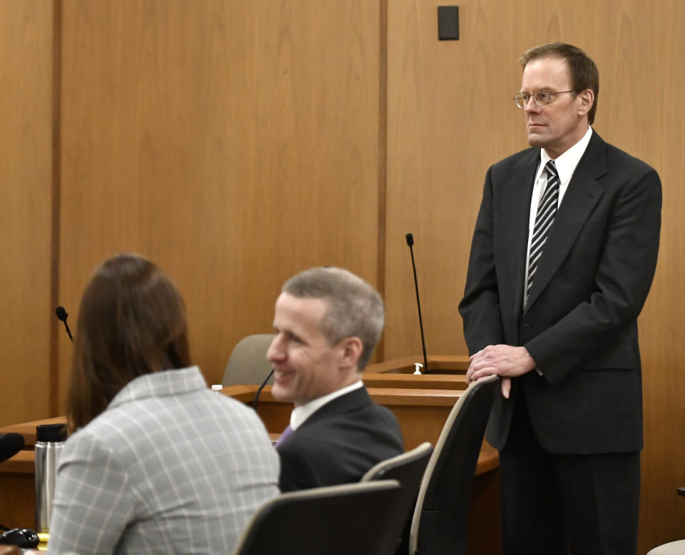 Mark Jensen stands as he waits for the jury to enter the room during his trial at the Kenosha County Courthouse on Wednesday, Jan. 11, 2023, in Kenosha, Wis. The Wisconsin Supreme Court ruled in 2021 that Jensen deserved a new trial in the 1998 death of his wife Julie Jensen, who was poisoned with antifreeze. (Sean Krajacic/The Kenosha News via AP, Pool)