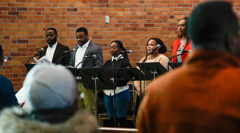 The choir at the French Mass at Holy Family in Whitefish Bay sings a capella for now, because they do not have a pianist. From left: Jean-Luc Ngoie, Cyrille Monatshebe, Annette Kasongo, Vedastine Ngoy and Liliane McFarlane.