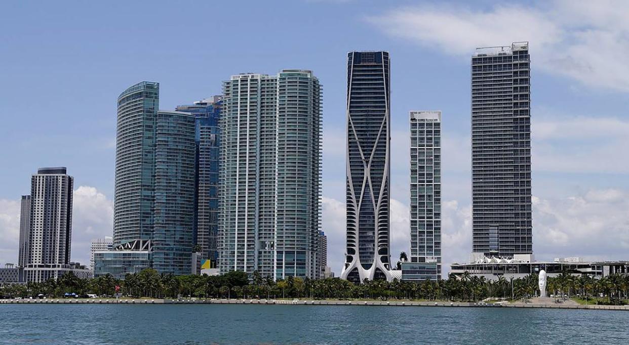 Miami could have around 80,000 properties flooding by mid-century, a multibillion-dollar risk, due to the combination of sinking land and rising seas, researchers say.