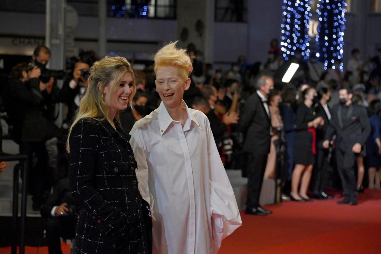 British actress Tilda Swinton (R) and her daughter Honor Swinton Byrne arrive for the screening of the film 