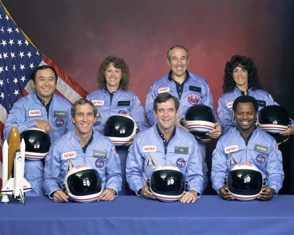 NASA's Space Shuttle Challenger crew members in an undated handout photo taken at Johnson Space Center in Houston, Texas. Left to right: Mission Specialist Ellison S. Onizuka, Pilot Mike Smith, Teacher in Space Christa McAuliffe, Commander Dick Scobee, Payload Specialist Greg Jarvis, Mission Specialist Ron McNair and Mission Specialist Judy Resnik.