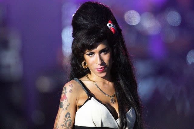 <p>Dan Kitwood/Getty</p> Amy Winehouse at Hyde Park in London in June 2008