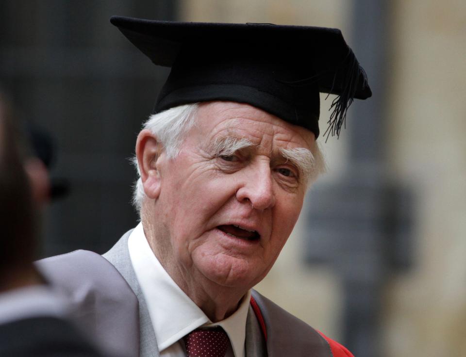 British author David Cornwell, also known as John le Carre, poses for photographers following a ceremony at Oxford University, where he was presented with an honorary Doctor of Letters degree in Oxford, England, Wednesday, June 20, 2012. (AP Photo/Lefteris Pitarakis)