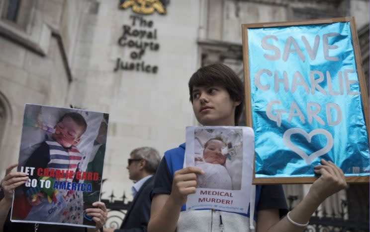 Protesters outside the High Court in London yesterday (Rex)