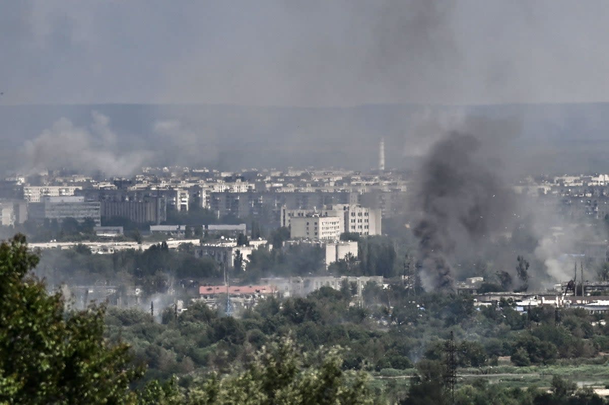 Smoke and dirt rise from the city of Severodonetsk (AFP via Getty Images)