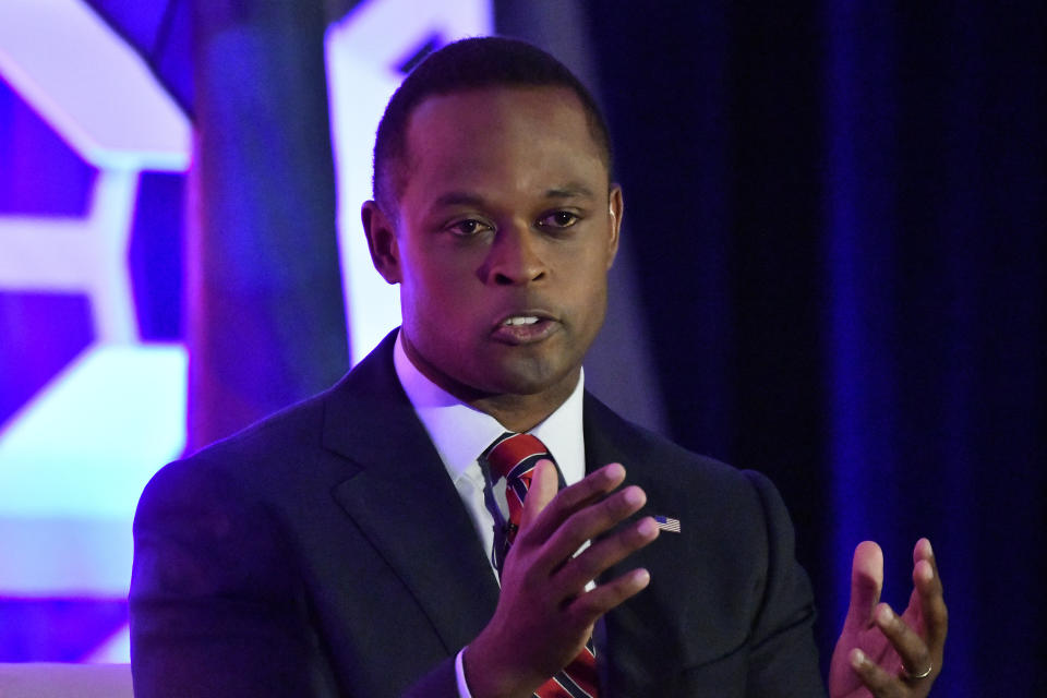 Kentucky Attorney General Daniel Cameron responds to a question from the moderator during the Gubernatorial Forum at the 2023 Kentucky Chamber of Commerce annual meeting dinner in Louisville, Ky., Wednesday, Sept. 20, 2023. (AP Photo/Timothy D. Easley)