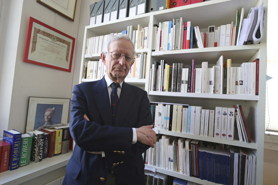 In this photo taken Tuesday, April 2, 2013, Michael Edwards poses for a photograph during an interview with The Associated-Press at his office at the College de France in Paris. The man who will soon become the newest official guardian of the French language has spoken: English, he says, is jumping the barricades and threatening the language of Moliere. Edwards should know. He's British - the first to become one of the 40 esteemed “immortals” of the Academie Francaise, the institution that has watched over the French language since 1635. (AP Photo/Michel Euler)