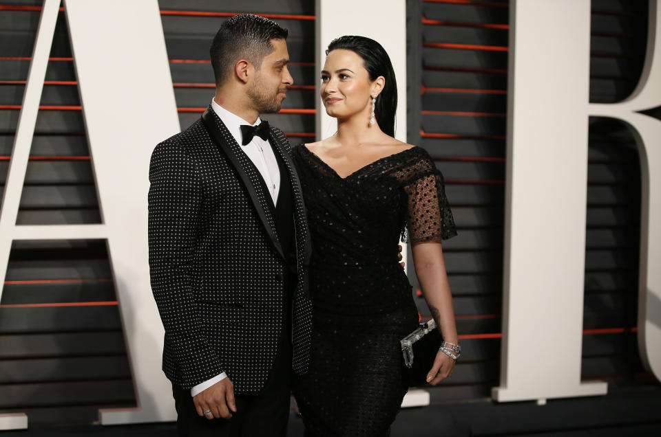 Actor Wilmer Valderrama and singer Demi Lovato arrive at the Vanity Fair Oscar Party in Beverly Hills, California February 28, 2016.  REUTERS/Danny Moloshok