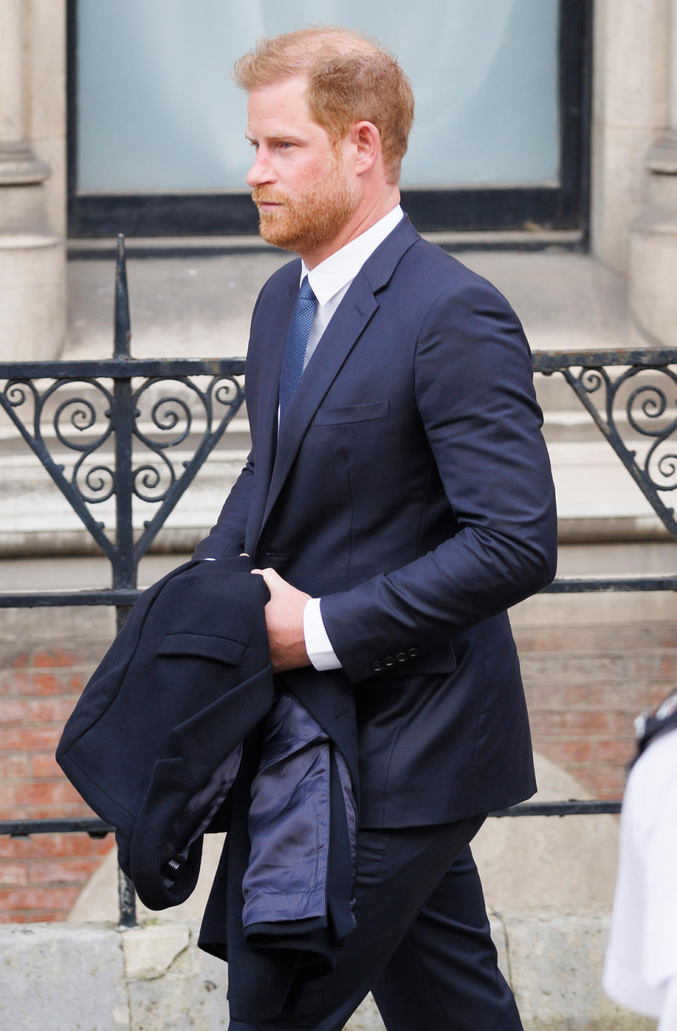 Prince Harry walking out of court