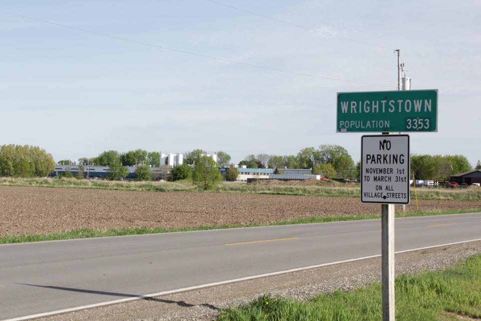 A sign on County U welcomes drivers to Wrightstown.