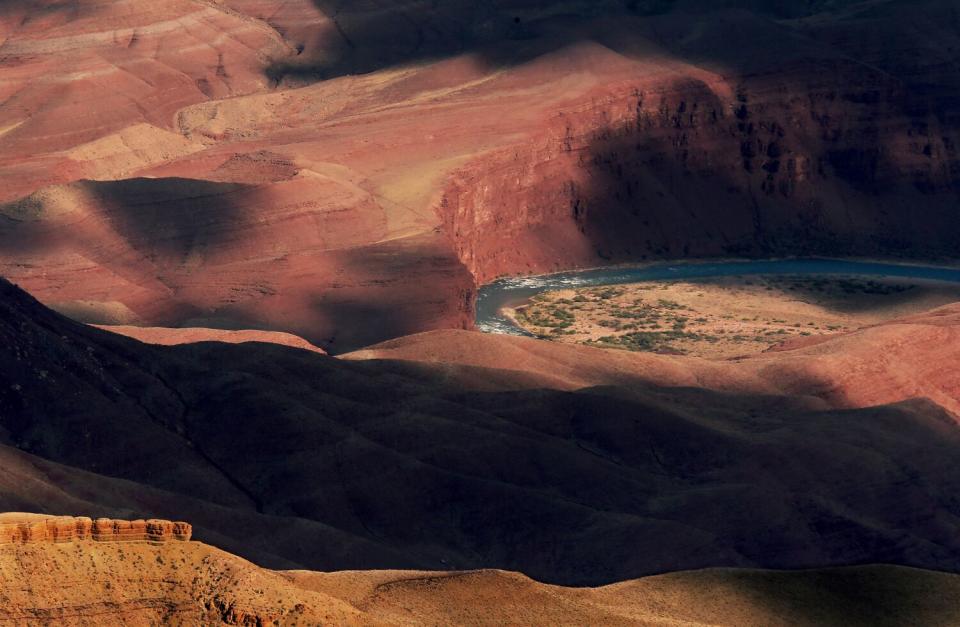 The Colorado River snakes through the rocky confines of the Grand Canyon below Cape Royal on the north rim.