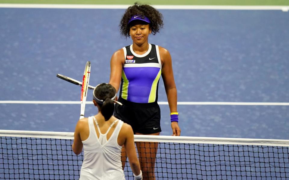 Naomi Osaka, of Japan, above, greets Misaki Doi, of Japan, at the net after defeating her during the first round of the US Open tennis championships, Monday, Aug. 31, 2020, in New York - AP/ Frank Franklin