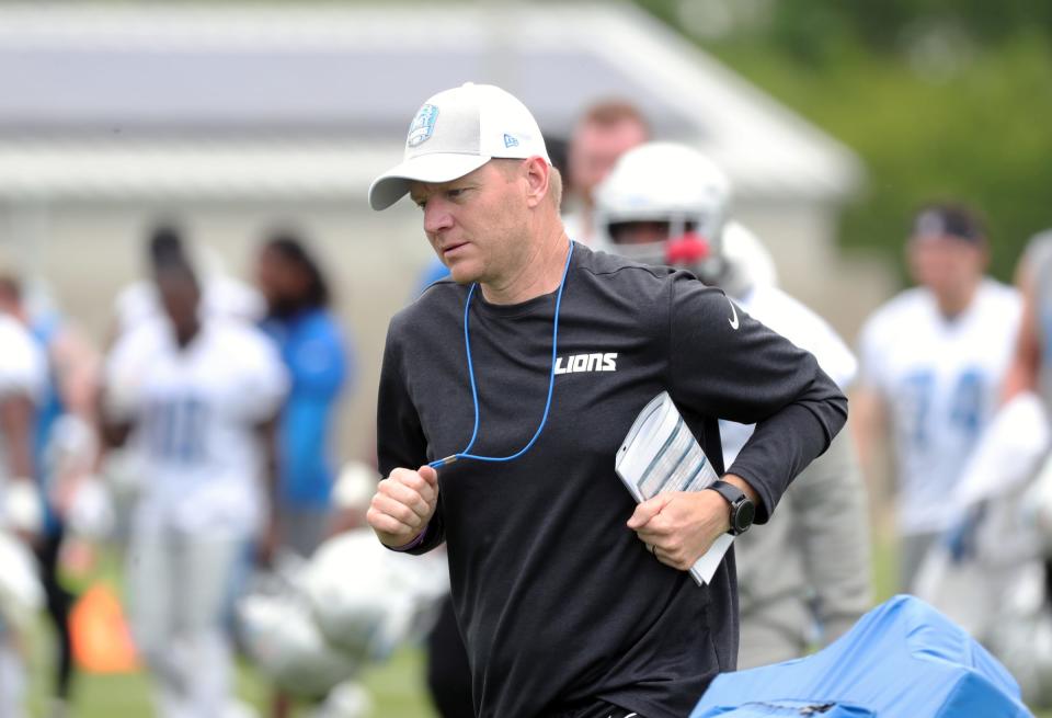 Lions offensive coordinator Darrell Bevell runs off the field after minicamp on Tuesday, June 4, 2019, in Allen Park.