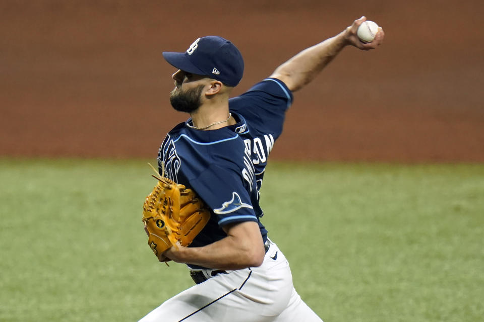 Tampa Bay Rays relief pitcher Nick Anderson delivers to the Toronto Blue Jays during the seventh inning of Game 1 of a wild card series playoff baseball game Tuesday, Sept. 29, 2020, in St. Petersburg, Fla. (AP Photo/Chris O'Meara)