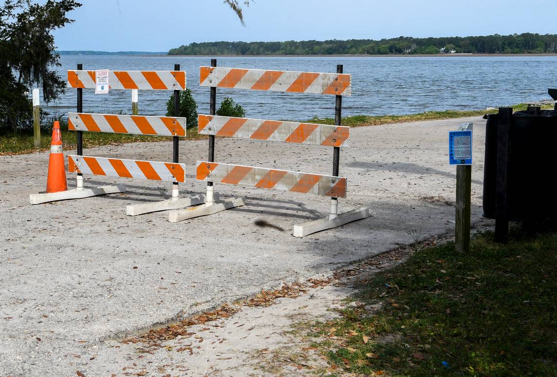 In this file photo of H.E. Trask Boat Landing from April 2020, barricades and a sign warn that the state’s boat landings and beaches are closed in hopes of stemming the spread of the coronavirus.