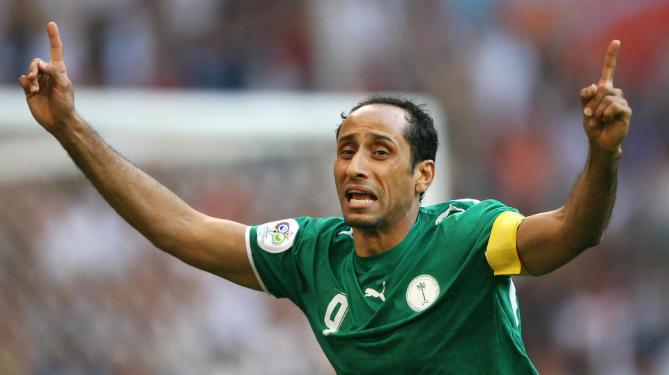 Munich, GERMANY:  Saudi Arabia forward Sami al-Jaber celebrates his goal against Tunisia in their first round Group H World Cup football match at Munich's World Cup Stadium, 14 June 2006. The match ended in a 2-2 draw.       AFP PHOTO / VALERY HACHE  (Photo credit should read VALERY HACHE/AFP via Getty Images)