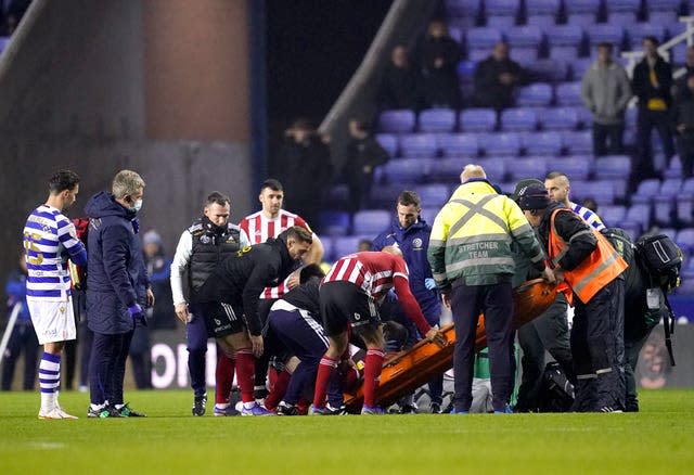 Action at the Madejski Stadium was delayed by 10 minutes