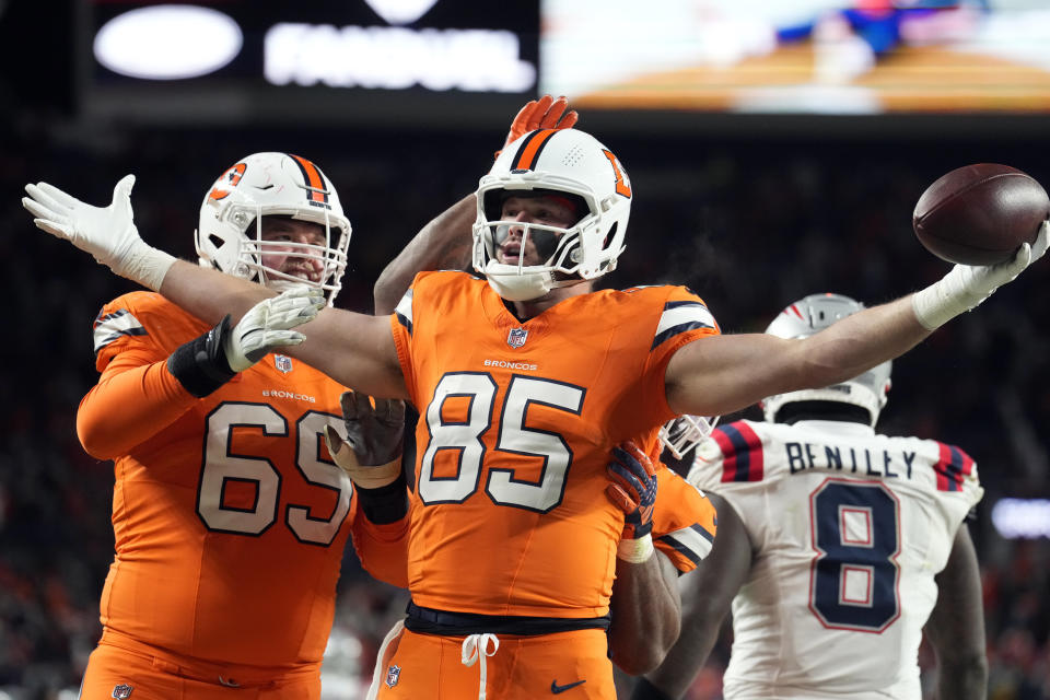 Denver Broncos tight end Lucas Krull (85) reacts after his 3-yard pass reception for a touchdown during the second half of an NFL football game against the New England Patriots, Sunday, Dec. 24, 2023, in Denver. (AP Photo/David Zalubowski)