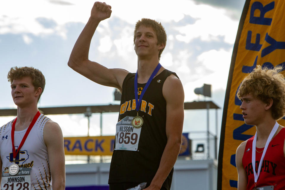 Gilbert High School's Vance Nilsson leads in boys' hurdles at Chandler Rotary Invitational at Chandler High School on March 23, 2024.