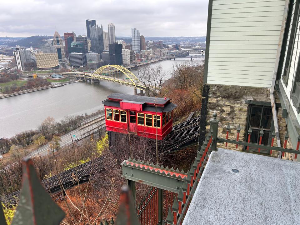 The Duquesne Incline car heading into the upper station overlooks downtown Pittsburgh on Nov. 22.