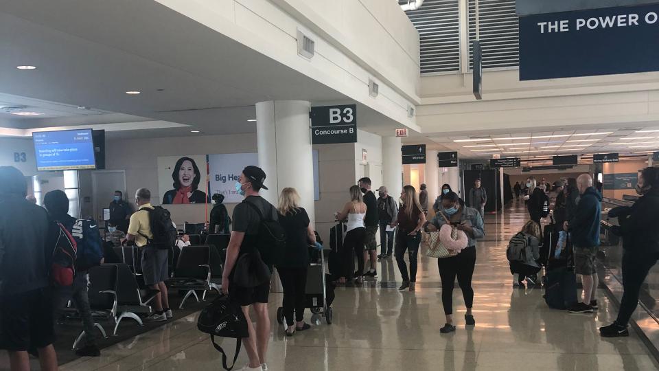 Passengers wait for boarding on a Southwest Airlines flight at Midway International Airport in Chicago. With travel picking up, gate areas might be more crowded than passengers expect.