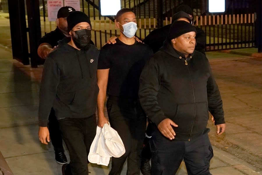 Actor Jussie Smollett, center, leaves the Cook County Jail, March 16, 2022, in Chicago. Smollett’s drawn out legal saga begins anew Tuesday, Sept. 12, 2023, when an Illinois appeals court will hear oral arguments that the former “Empire” actor’s convictions for staging a racist, homophobic attack against himself in 2019 and then lying about it to Chicago police should be tossed. (AP Photo by Charles Rex Arbogast, File)