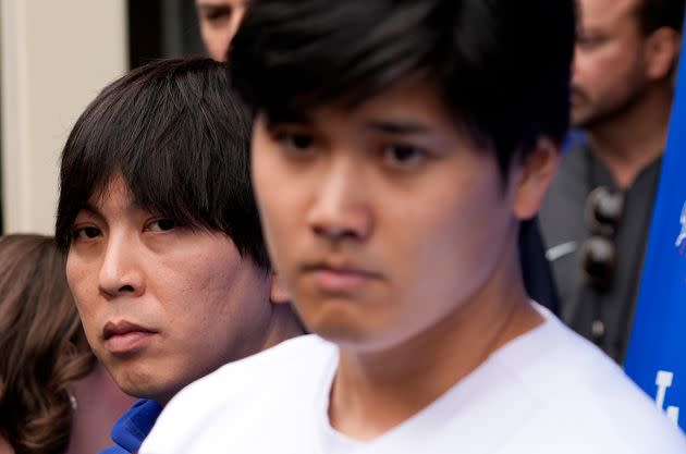 Ippei Mizuhara (left), shown here on Feb. 3 at Dodger Stadium in Los Angeles, had been a longtime interpreter for Shohei Ohtani.