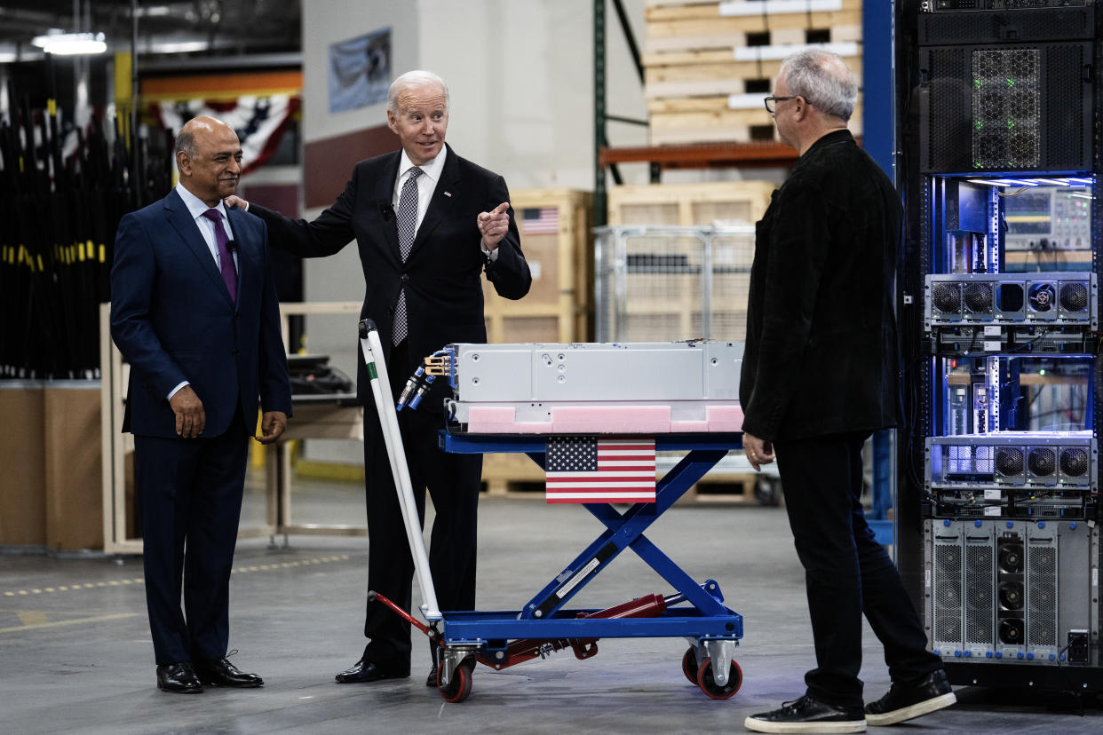 President Joe Biden tours an IBM facility in Poughkeepsie, N.Y., with the company’s chief executive, Arvind Krishna, left, on Oct. 6, 2022. (Erin Schaff/The New York Times)