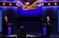 U.S. President Donald Trump and Democratic presidential nominee Joe Biden participate in their first 2020 presidential campaign debate in Cleveland