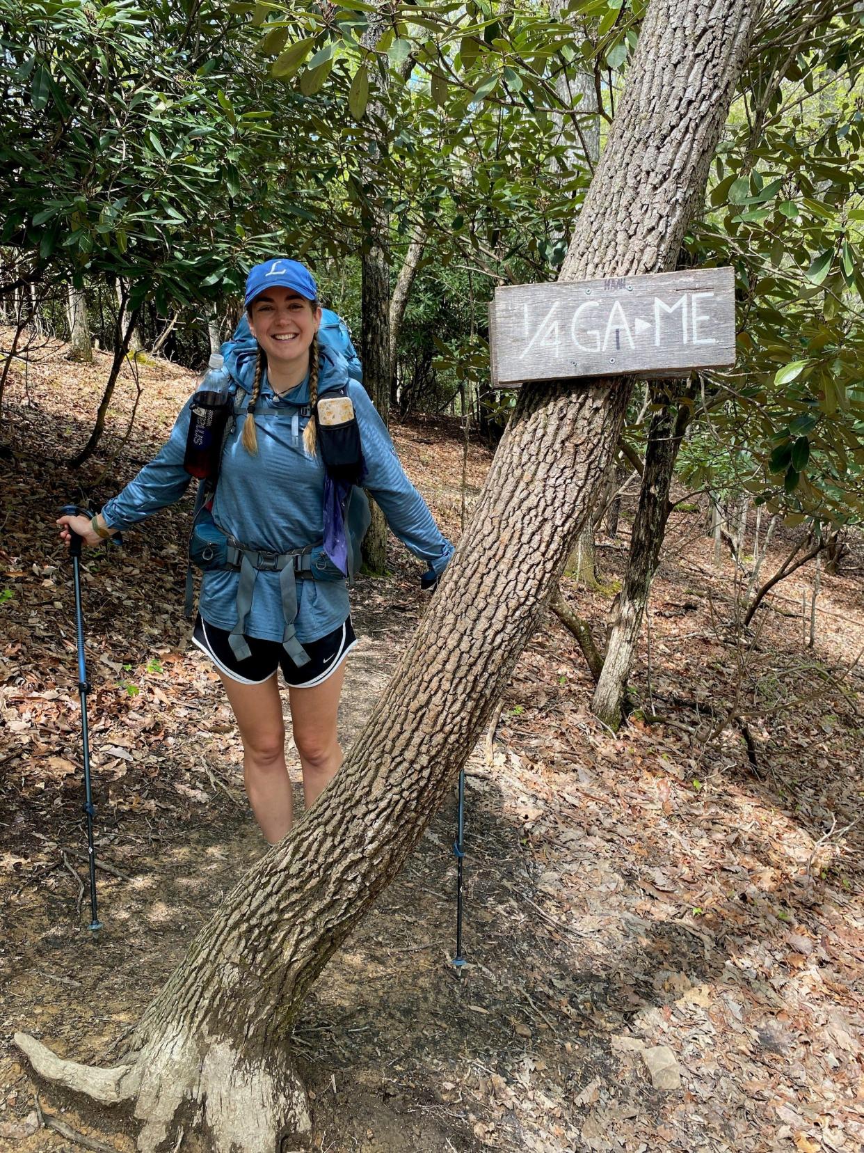 Alexis Holzmann, an Arlington High School grad, is photographed by a hiking partner during her 2,200-mile journey through the Appalachian Trail in summer 2023.