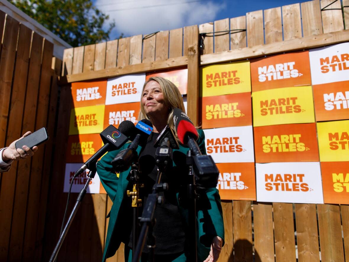 Marit Stiles speaks to reporters after she announced her intention to run in the Ontario NDP leadership race, during a news conference in her riding of Davenport, in Toronto on Thursday, Sept. 22, 2022.  (Cole Burston/CBC - image credit)