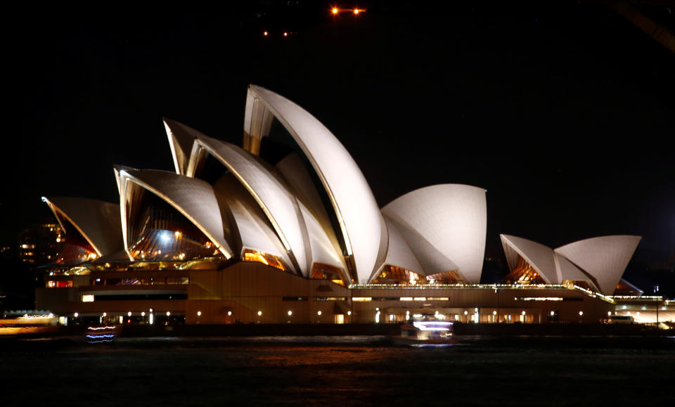 The Sydney Opera House seen before the tenth anniversary of Earth Hour in Sydney, Australia, March 25, 2017.      REUTERS/David Gray