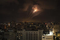 Rockets fired by Palestinian militants toward Israel, in Gaza City, Saturday, Aug. 6, 2022. The latest confrontation between Israel and Gaza militants is in its second day, as Israeli jets hit targets in Gaza and rocket fire persists into southern Israel. Palestinian officials say at least 15 people have been killed in Gaza, including a senior militant leader and a 5-year-old girl. (AP Photo/Fatima Shbair)