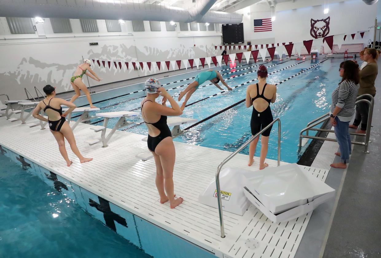 The South Kitsap girls swim team practices their starts in their renovated pool on Wednesday, Oct. 18, 2023 at South Kitsap High School.