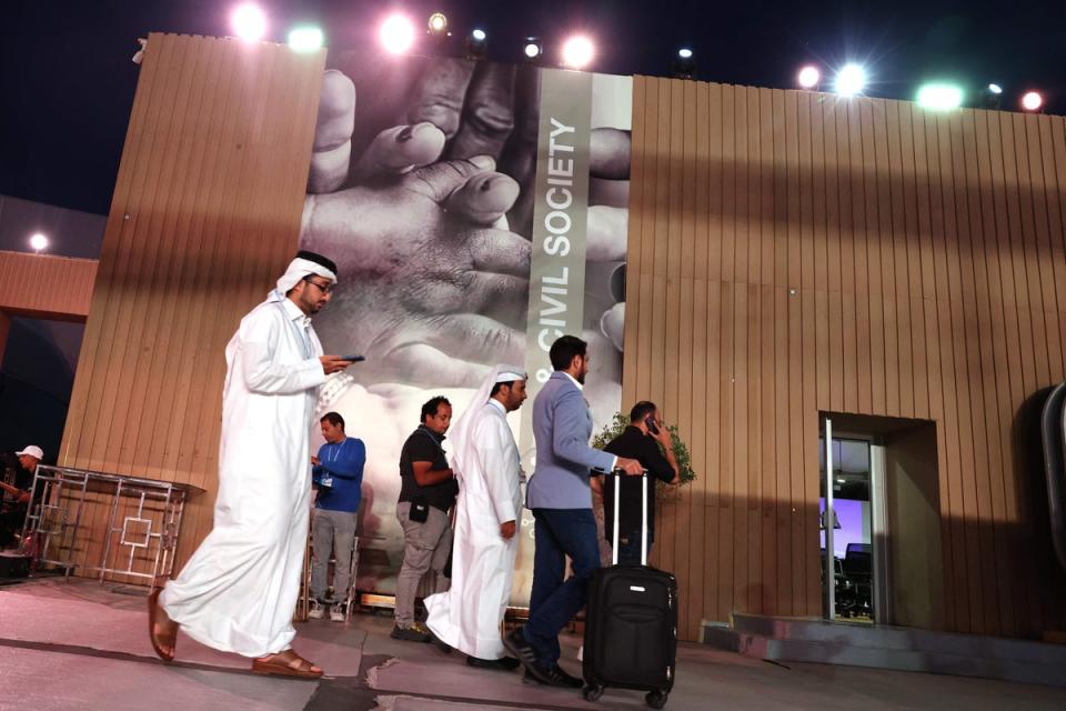 Participants arrive at Cop27 in Sharm el-Sheikh (AFP via Getty Images)